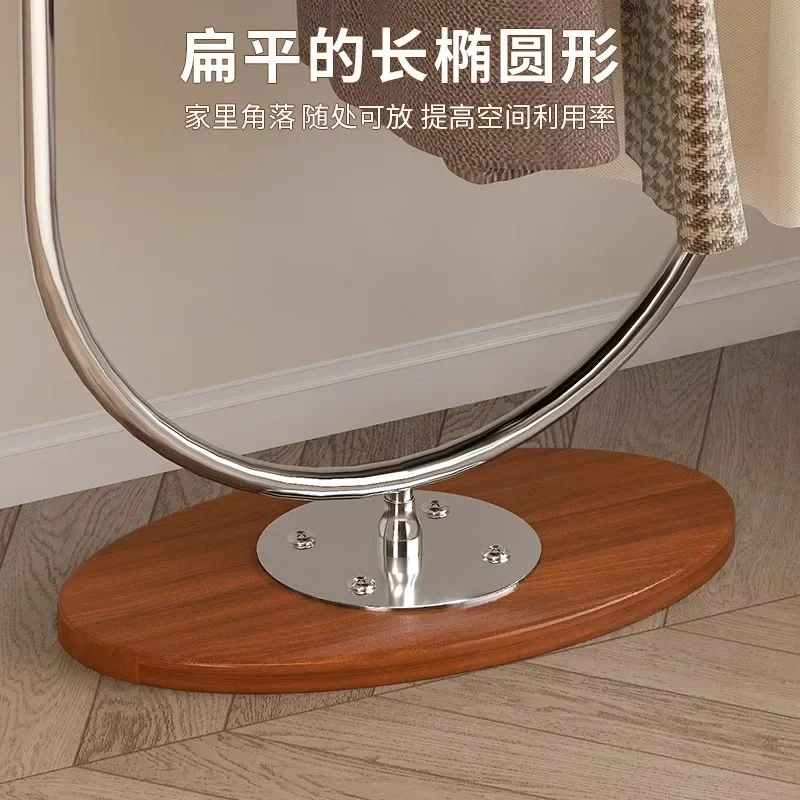 ราวแขวนเสื้อผ้าสไตล์ยุคกลาง แบบตั้งพื้นถึงเพดาน สำหรับแขวนเสื้อผ้าที่ใช้ในค้างคืน ชั้นวางเก็บเสื้อผ้าในห้องนั่งเล่น สไตล์หรูหราเบาๆ ทำจากสแตนเลส