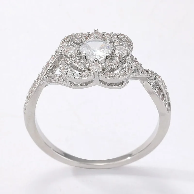 Exquisiter silberfarbener, mit weißen CZ-Steinen eingelegter Damenring, geometrisch, hohl, für den täglichen Gebrauch, Partyschmuck – Detail 2