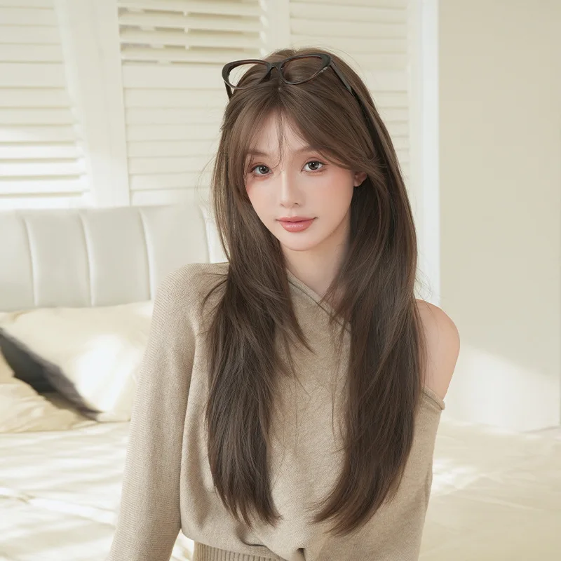 Women's long straight synthetic wig with middle parting and wavy bangs, realistic layered look
