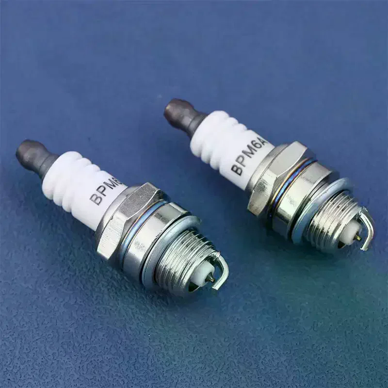 1PC Chainsaw Lawn Mower Spark Plug For Engine Motor Trimmer Spare Parts BM6A With Packaging