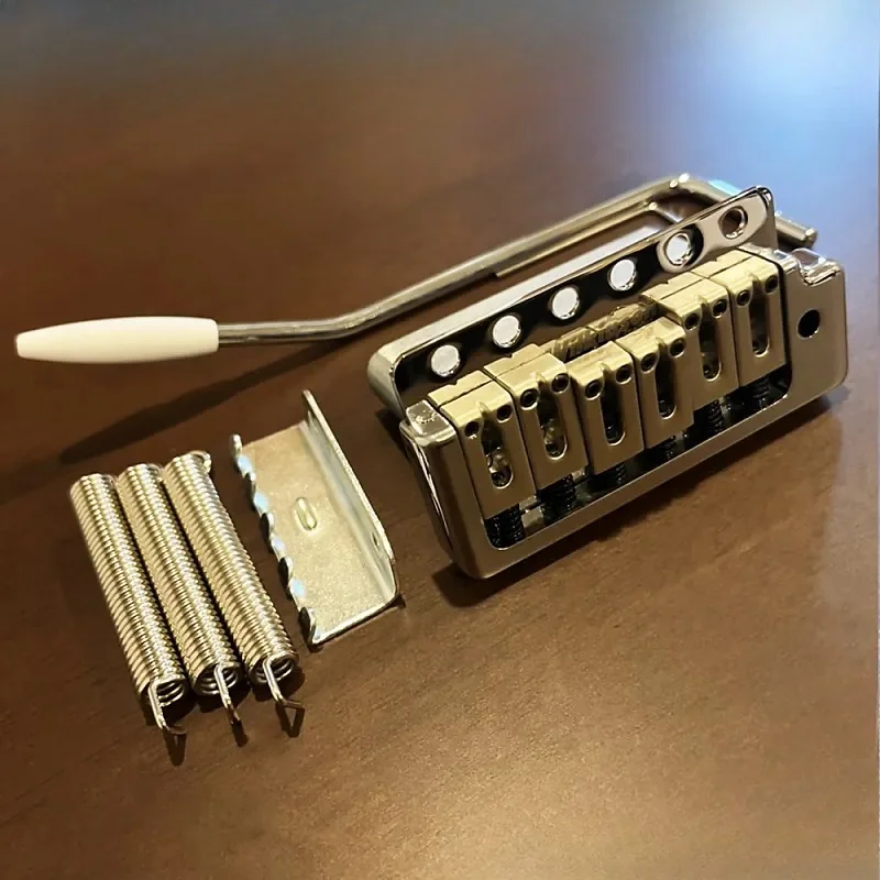 

Гитара Wilkinson с фиксированным тремоло Vibrato Bridge, 6 винтов, Tremolo Gold WOV09