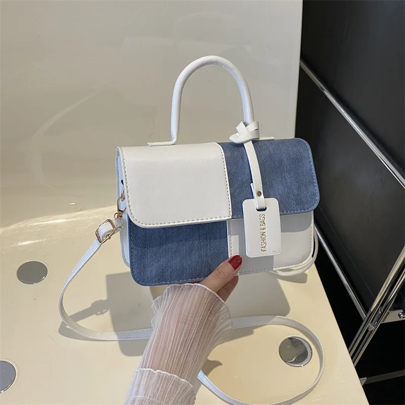 

This year's trendy fashion patchwork textured handbag is a stylish and chic shoulder/crossbody bag for commuting