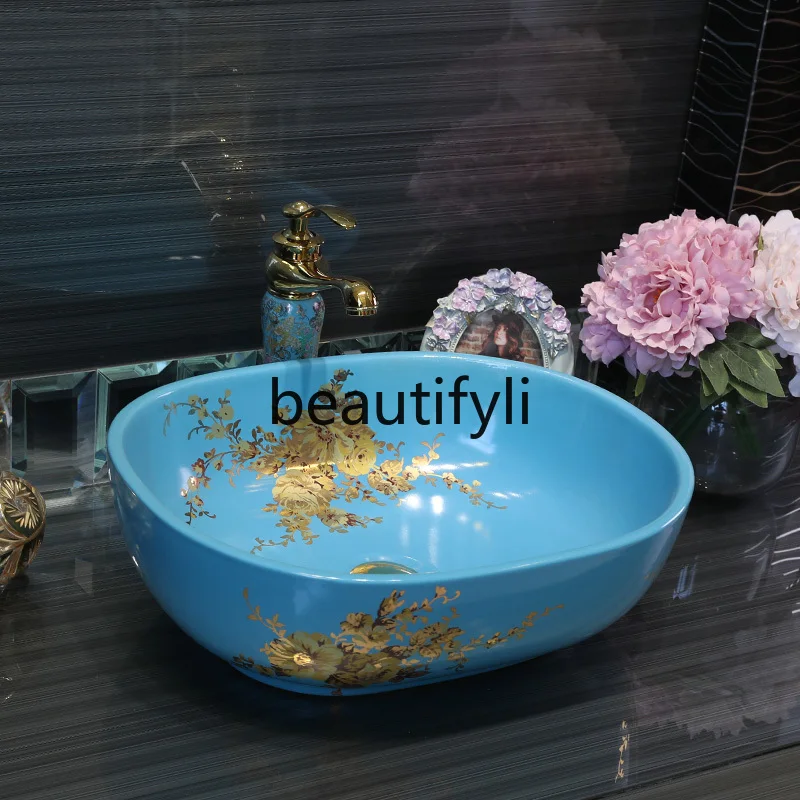 

Blue modern countertop basin oval basin gold pattern