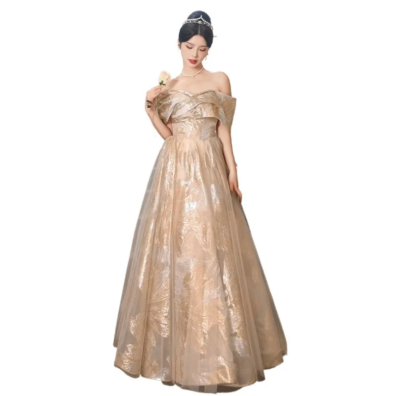 2026 New Women's Spring Festival Golden One Shoulder Evening Dress Fashionable Slimming Annual Meeting Art Exam Host Long Dress