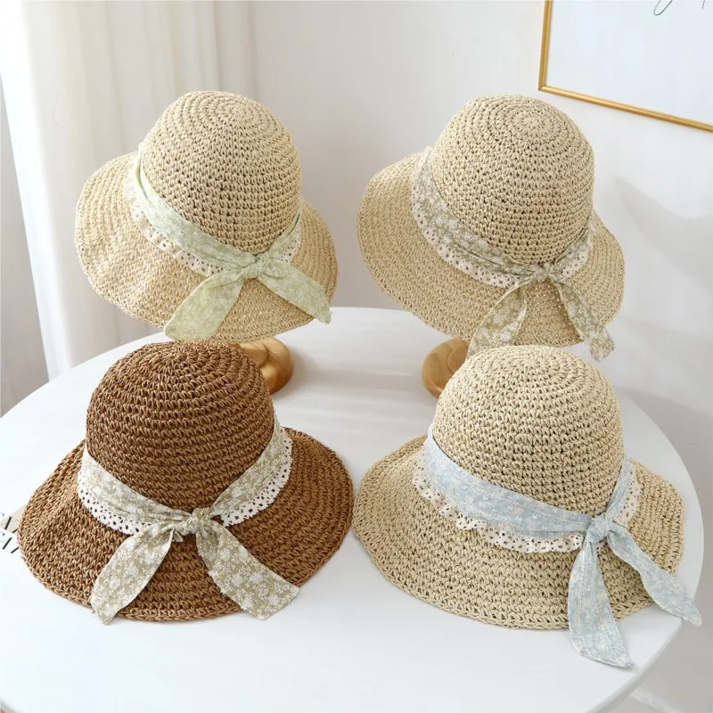 A hat girl goes on seaside vacation woven with large outdoor brim that shows off the face small breathable
