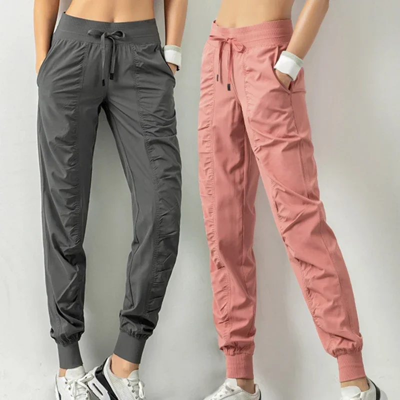 Pantaloni della tuta in tessuto con coulisse da corsa Pantaloni sportivi da donna Quick Dry Atletico Palestra Fitness con due tasche laterali