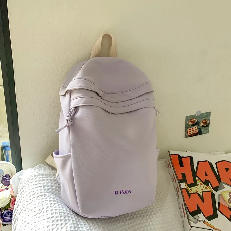 Mochilas casuais de nylon versátil feminina, mochila de grande capacidade, simples sólido fresco, alta qualidade, moda, à venda, 2024