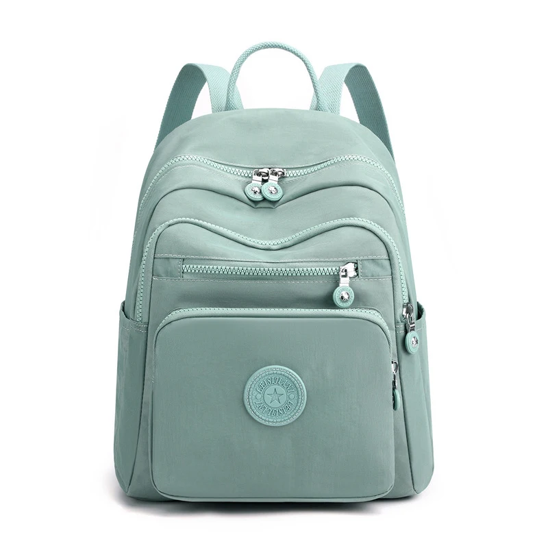 Han edition fashion female bag mother bag backpack large capacity nylon fabric lady's bag pure color small backpack