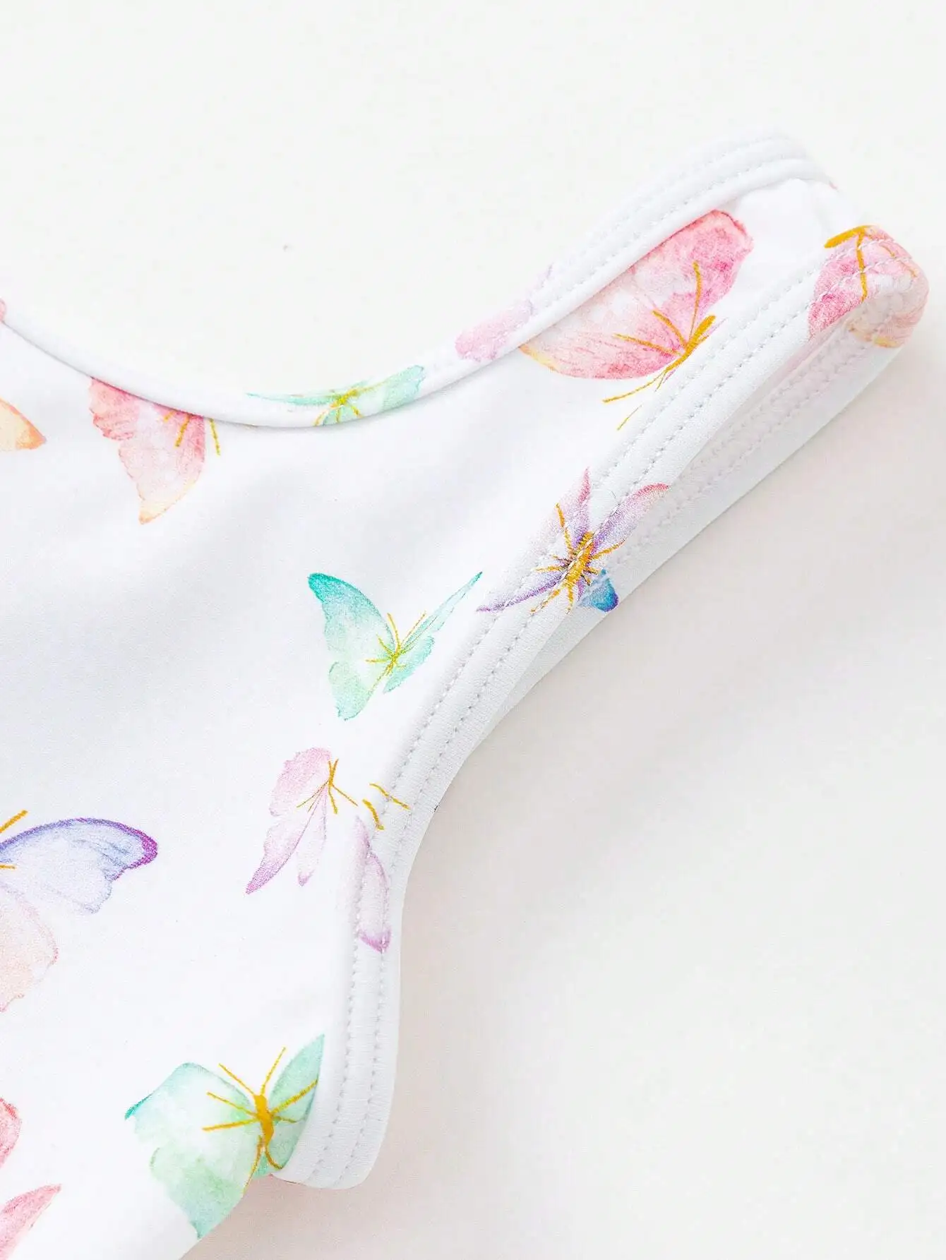 

Girls One-Piece Swimsuit With Butterfly Pattern, Suspender Skirt Design And Matching Swim Cap