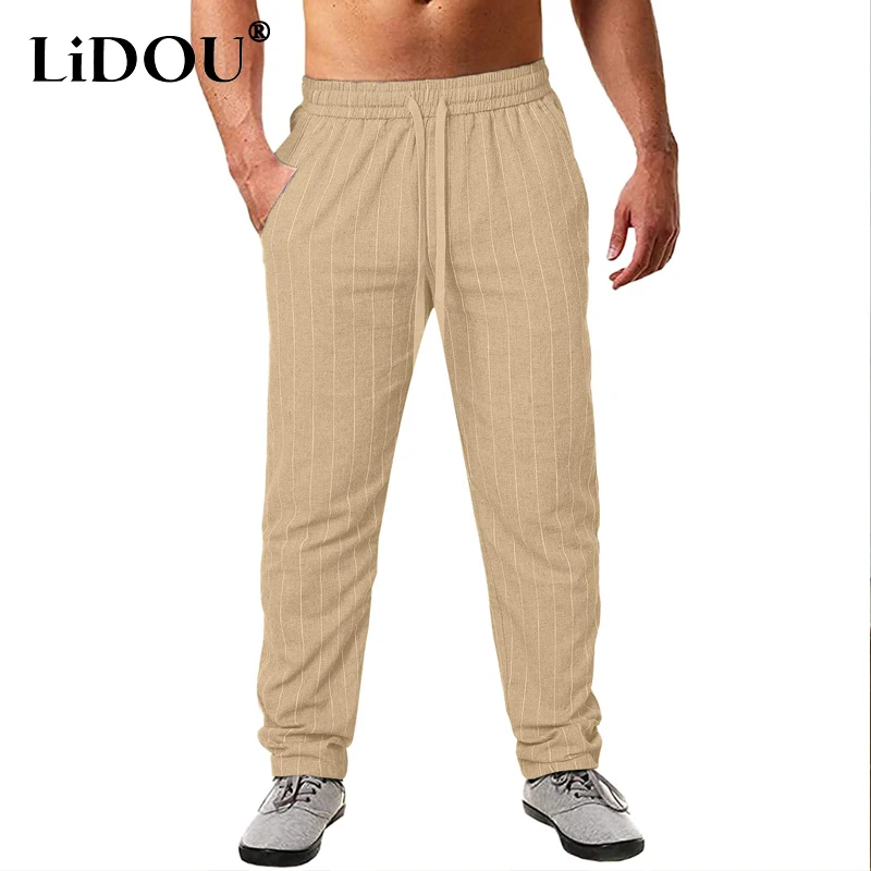 

2023 Spring Summer New Fashion Striped Elastic Waist Drawstring Straight Pants Man Casual Loose Cotton Hemp All-match Trousers