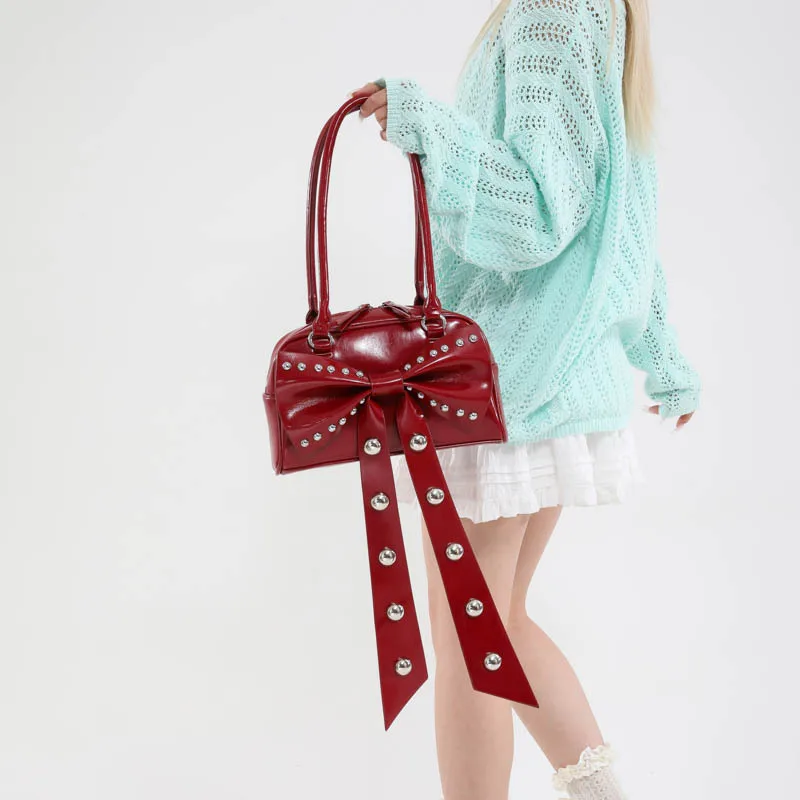 

Hot-selling Seasonal Popular Versatile Explosion Rivet Bow Decorative Bowling Bag Locomotive Fashion Designer Spice Girl Bag