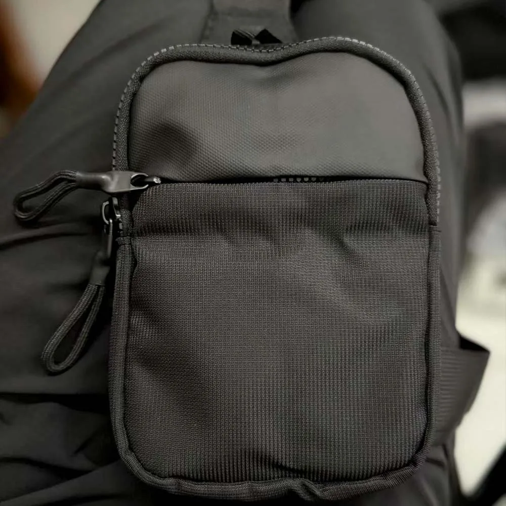 Tas selempang tahan air, korset unisex, cocok untuk ponsel berukuran 7,5 inci