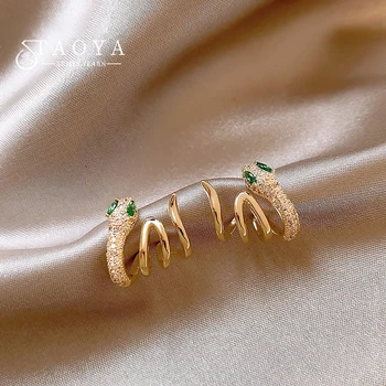 Inspirowane designem złote kolczyki serpentynowe dla kobiet Akcesoria modowe 2024 Jesień / zima Luksusowy mikro zestaw biżuterii z cyrkoniami