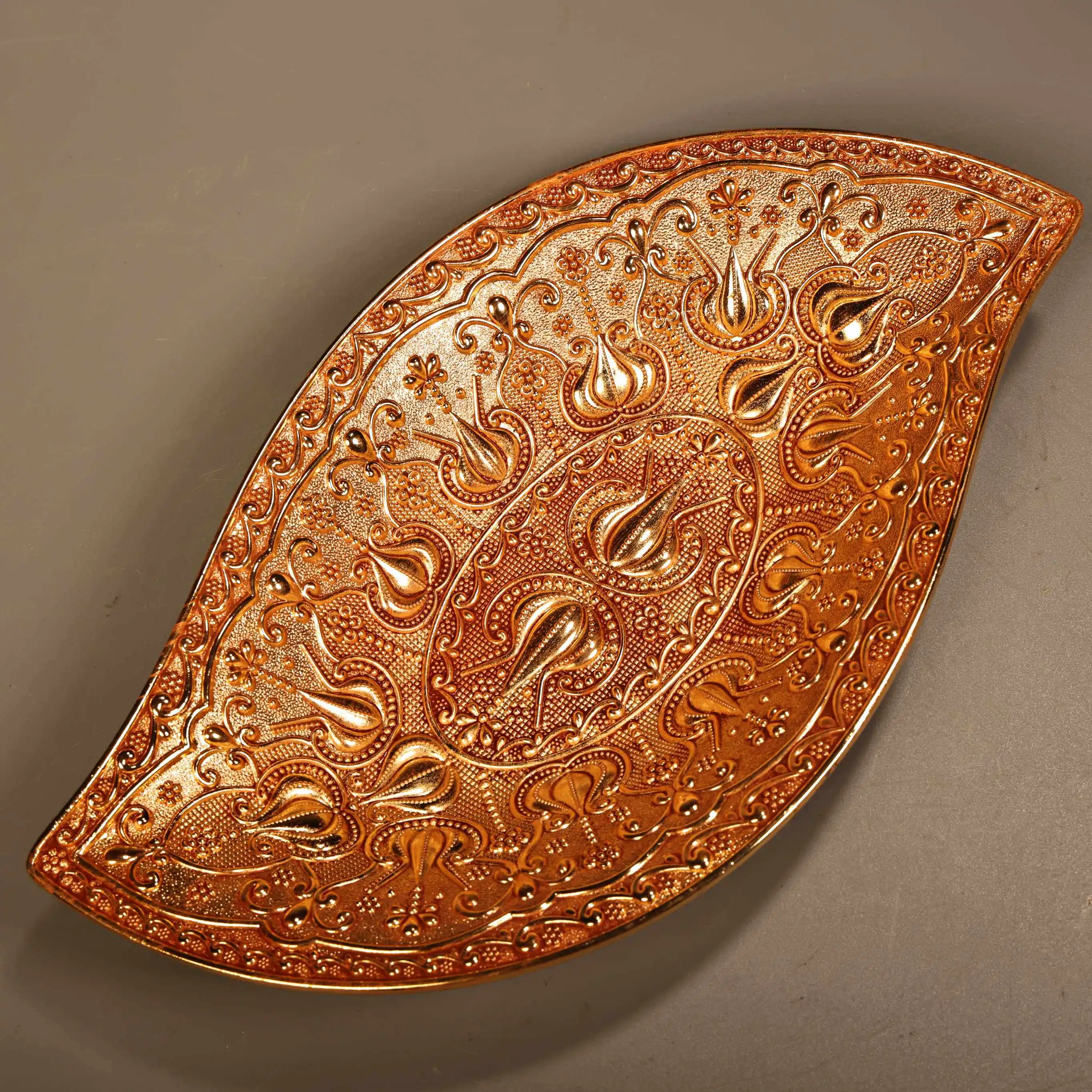 Gilt Bronze Plate with High Relief Chisel-Carved Decoration
