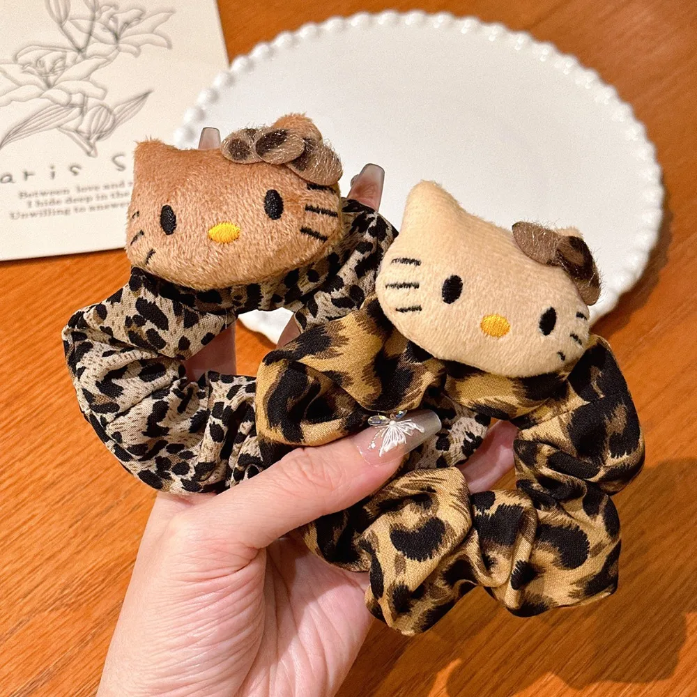 Sanrio Hello Kitty estampado de leopardo pinzas para el cabello y lazos para el cabello de bebé Otoño/Invierno pinzas para el cabello de moda para niña regalos de vacaciones