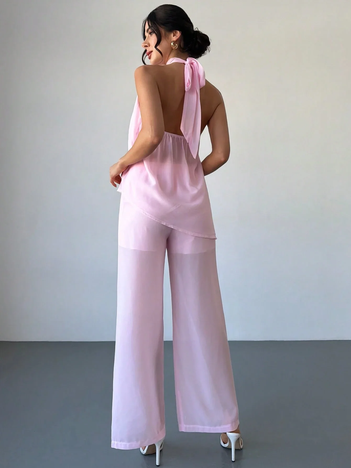 

Elegant Pink Chiffon Halter Neck Sleeveless Asymmetric Blouse And Loose Wide Leg Pants Set