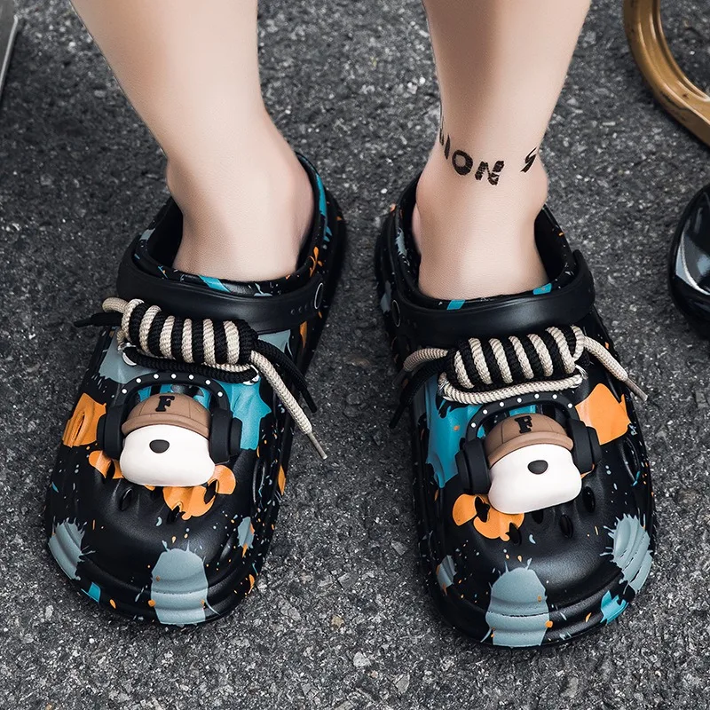 زوج من شباشب رجالية EVA ذاتية الصنع مزينة بسماعات أذن لطيفة ومثيرة للاهتمام، مناسبة للاستخدام الداخلي والخارجي على حد سواء