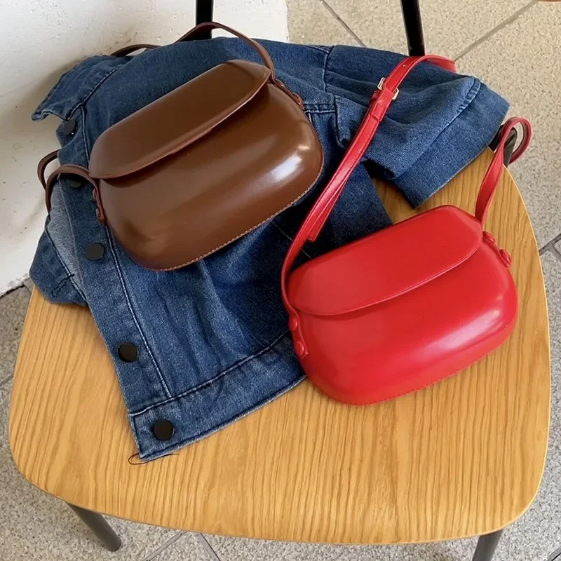 Korean Candy Color Matching Creative Niche Design Rounded Leather Crossbody Shopping Mobile Phone Storage Bag