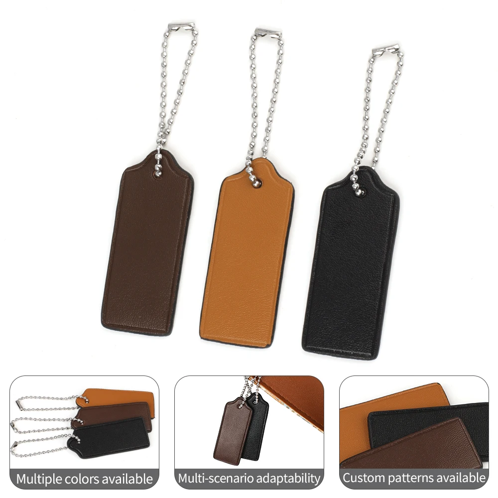 جلد البقر علامة الأمتعة حقيبة السفر العلامات أكياس الملحقات حقيبة جلدية حقيقية سحر سلسلة المفاتيح قلادة حقيبة يد محفظة شنق