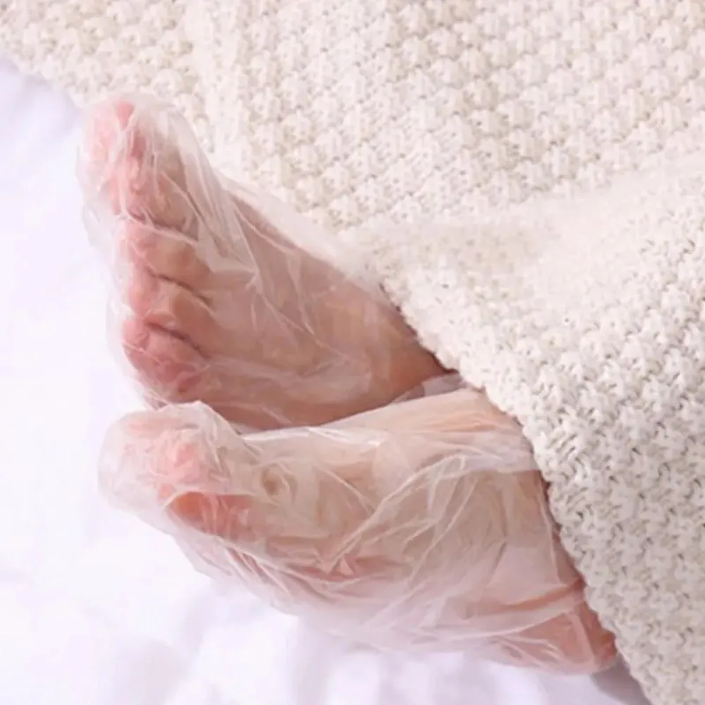 100/200 Uds. Calcetines desechables para hidratar los pies, bolsas transparentes para pies, cubiertas de PE para SPA de pies, removedor de callos, herramientas de pedicura para el cuidado de los pies