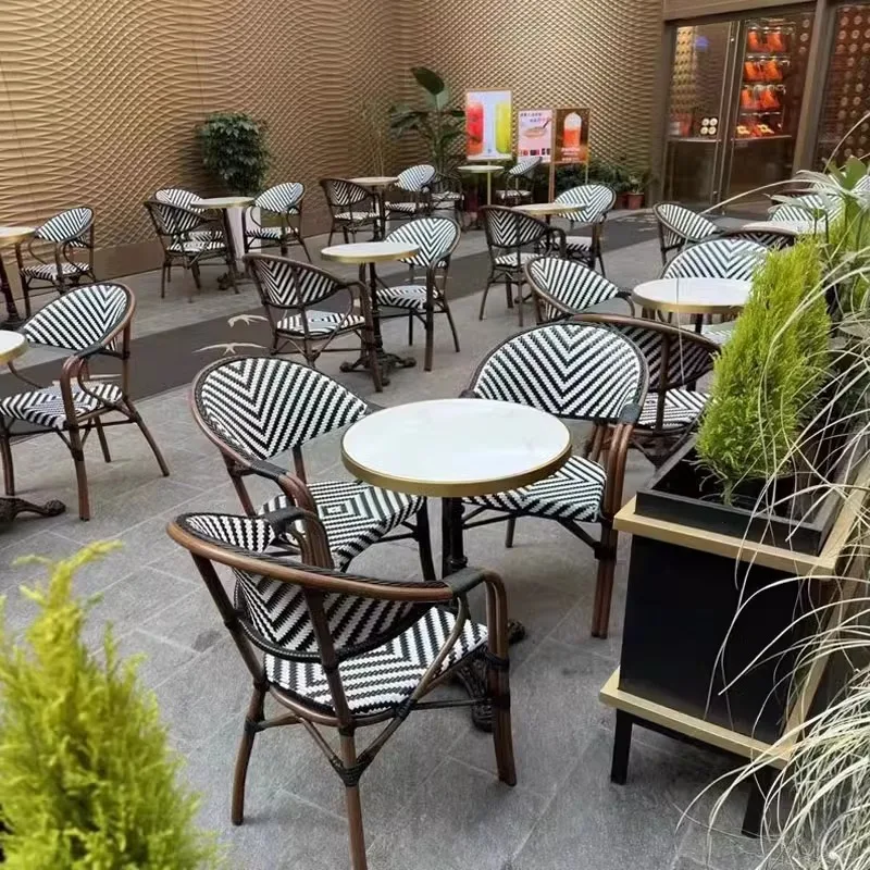 

Outdoor French tables and chairs Balcony rattan chairs rattan chairs three-piece cafe milk tea shop homestay outdoor retro dinin