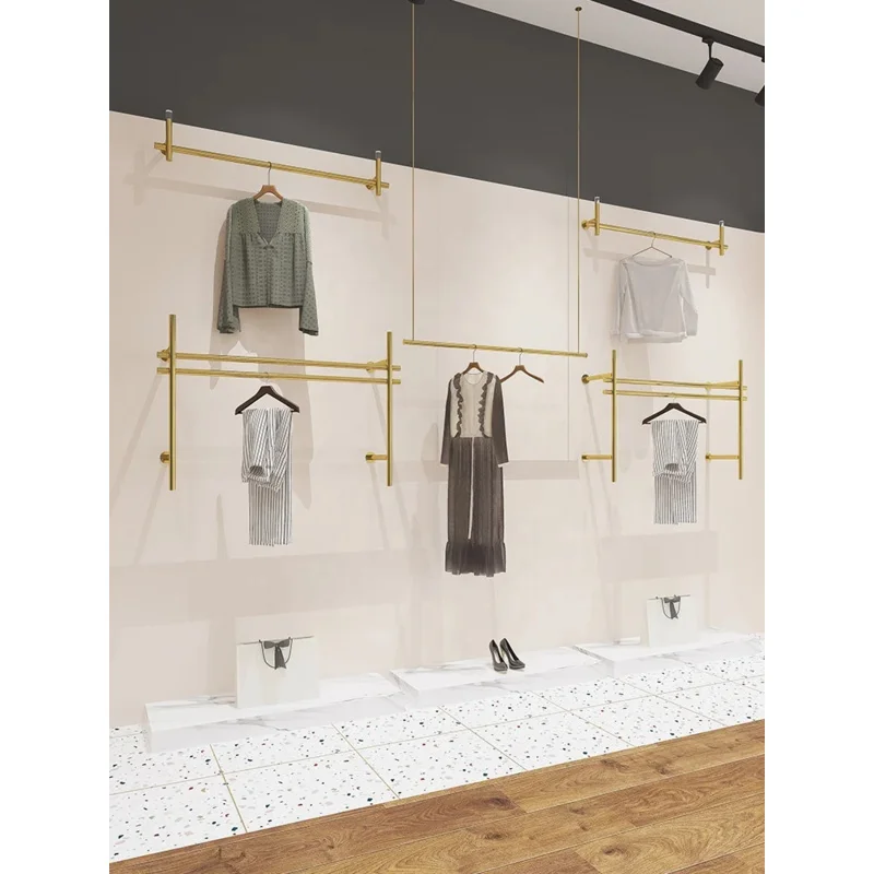 custom.Gold Garment Metal Wall Mounted Hanging Rail Ceiling Display Rack Retail Clothing Shop Window Display