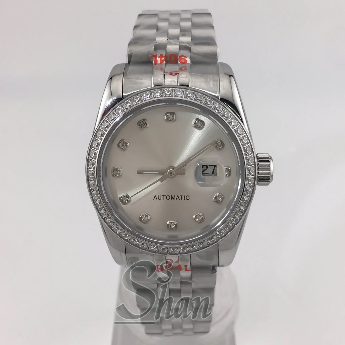 NH05 ファッショナブルな 31mm レディース自動巻き時計、ダイヤモンドベゼルとサファイアクリスタル、日光に晒されたホワイトパール文字盤、防水