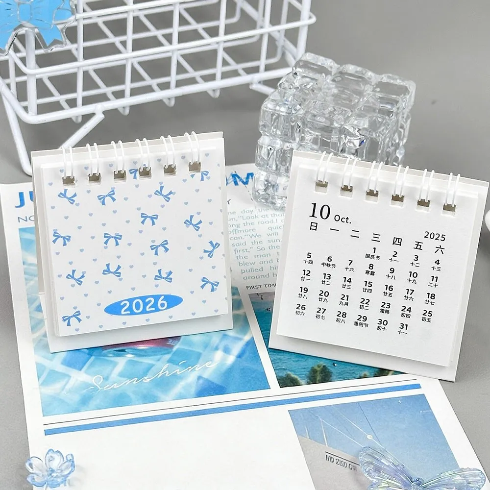 

Креативный мини-календарь на 2026 год с бантом, мультяшный настольный календарь, портативный планировщик на спирали, украшение для рабочего стола