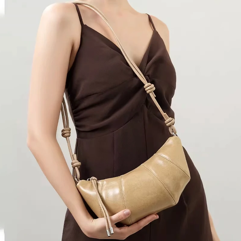 2026 new women's Mini cowhide leather Crossbody handbag luxury designer Lady commuting Shoulder Bag Oil Wax Leather Cowhorn bag