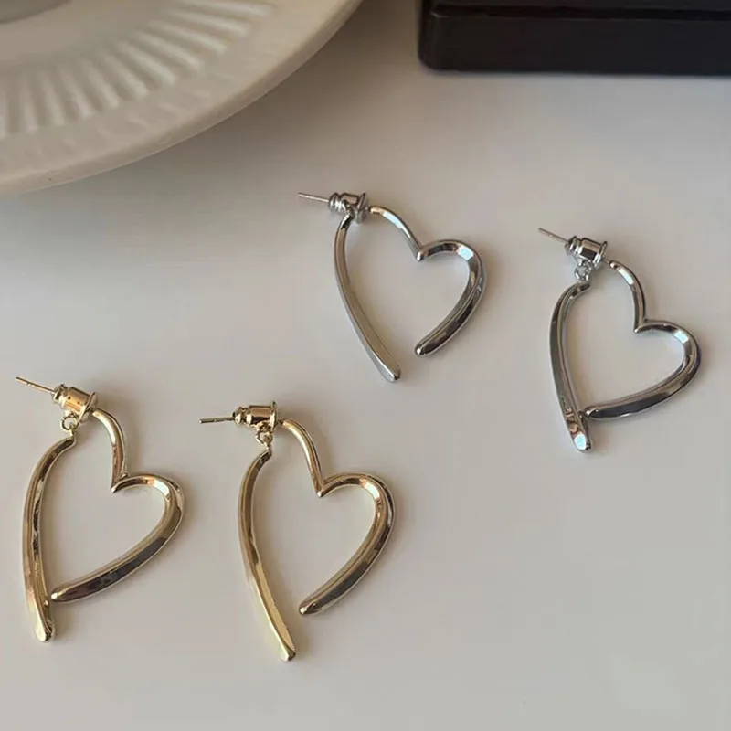 مزاجه بسيط غير النظامية القلب هندسية الأقراط s925 الفضة إبرة المرأة ارتداء اليومي مجوهرات الأزياء