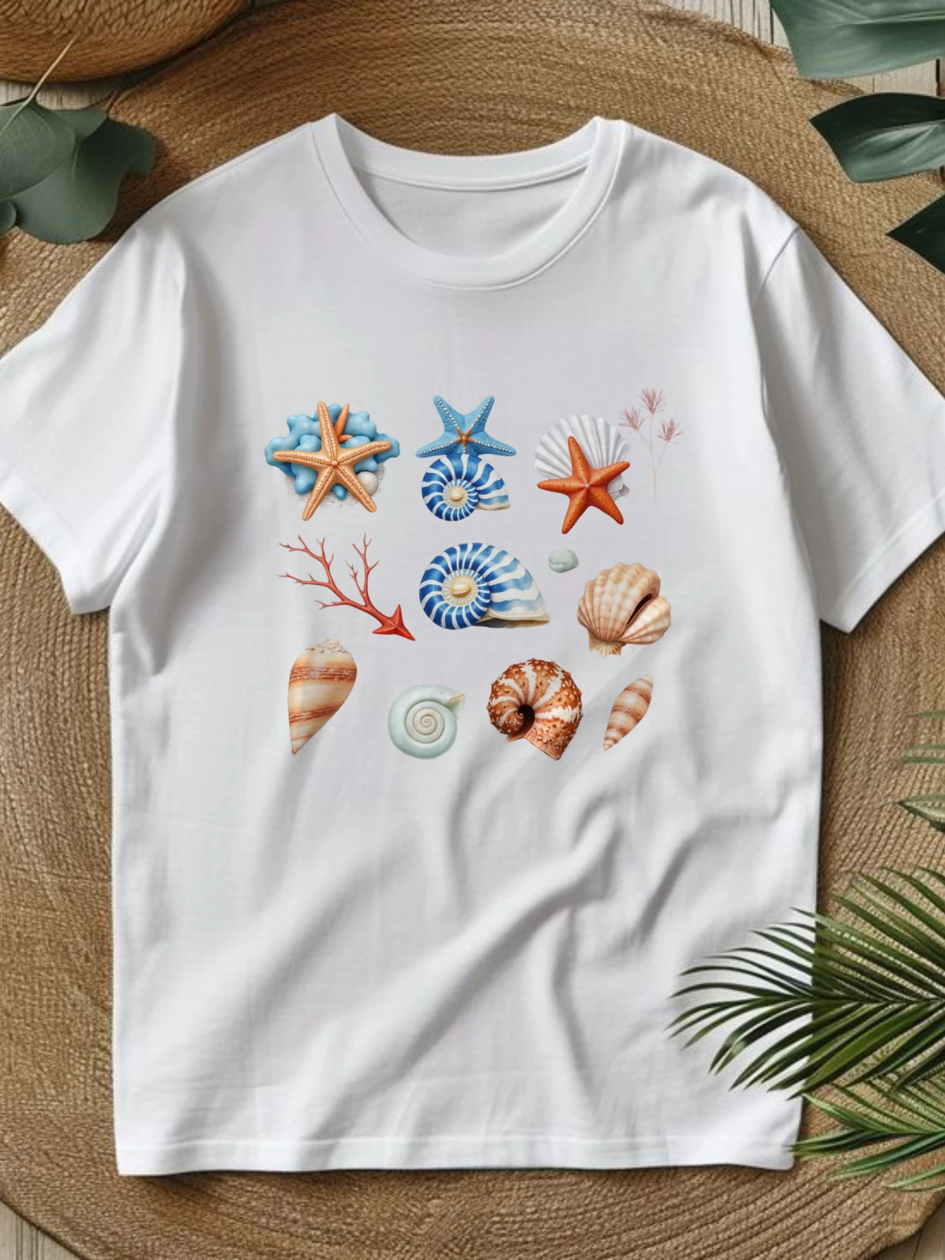 Women's Casual Beach T-Shirt - Light Beige Top with Starfish, Shells, and Coral Reef Pattern - Soft Everyday Summer Crew Neck Shirt - Machine Washable Coastal Vacation Outfit