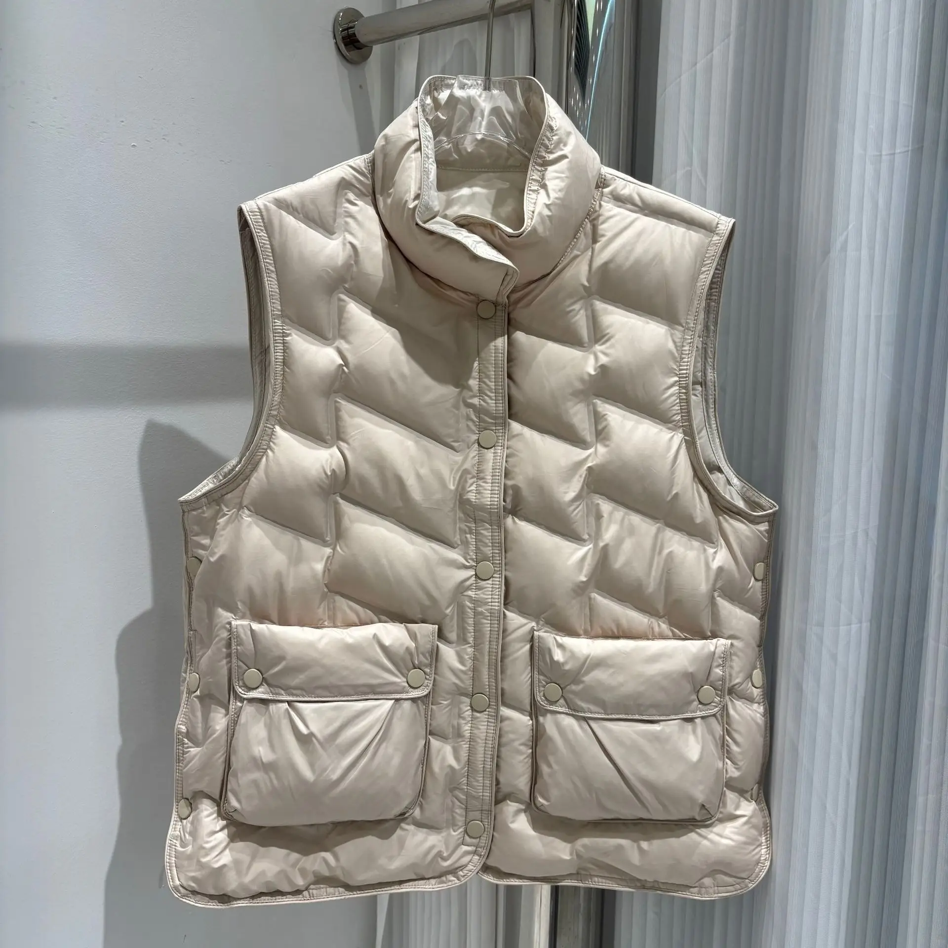 Nuevo Otoño Invierno chaleco de plumón de pato blanco ligero cuello alto acolchado abajo chaleco mujer Casual chaleco moda prendas de vestir exteriores