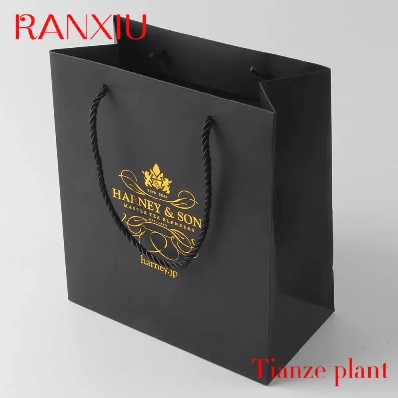 Custom Biodegradable luxury matte black shopping packaging paper bags with custom your own logo gift retail handbag ribbon handl