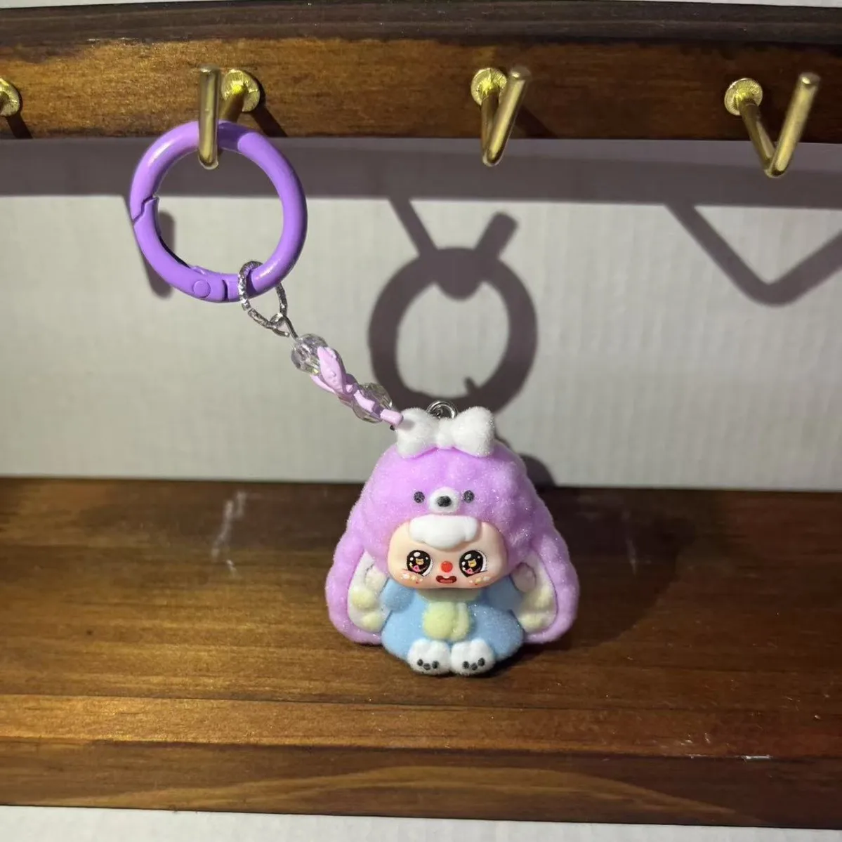 

High-end feeling ear-attached rabbit bean bag cute figurine toy with a bow accessory keychain