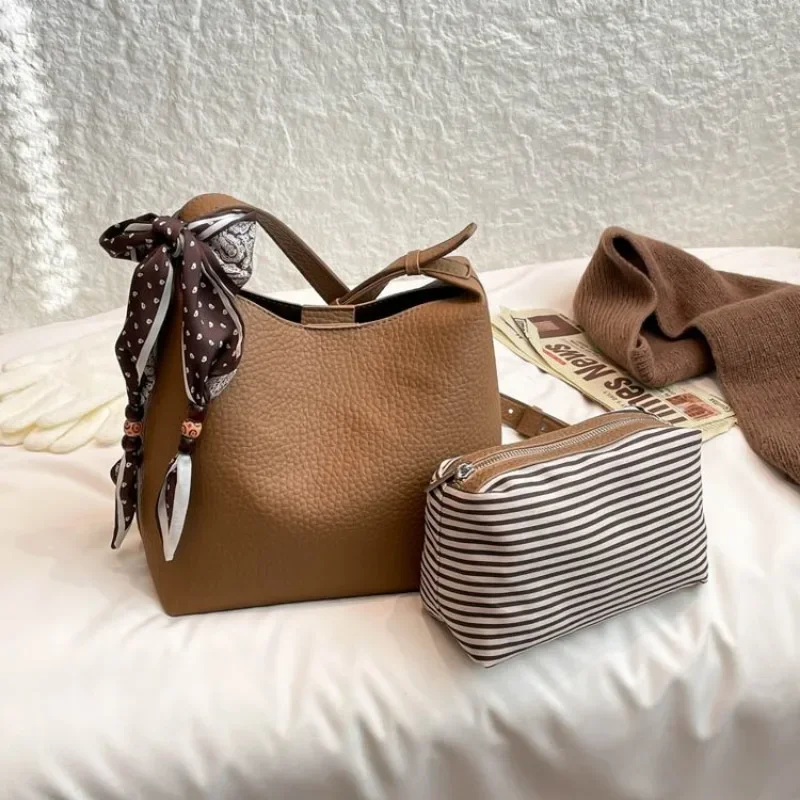 

Luxurious Sleek Diaper Bag Shoulder Baby Commuting Travel Exquisite Glamorous Timeless Elegant Stylish Functional Organized