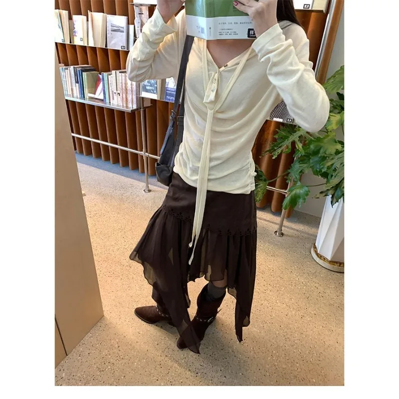 不規則な鹿革ベルベットカジュアルミッドレングススカート女性 2026 春ハイウエストソリッドカラーカジュアルメッシュステッチ A ラインスカート