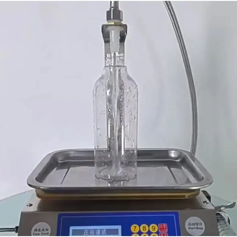 

Liquid Filling Machine 1-50ml 0.1ml Bottle Filler Machine Peristaltic Pump Weighing Filling Machine