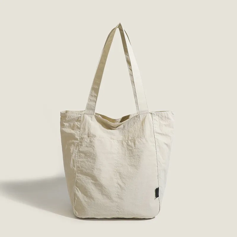 

New Waterproof Nylon Casual 2026 Summer Shoulder Bag with a Stylish Design and Large Capacity for Commuting