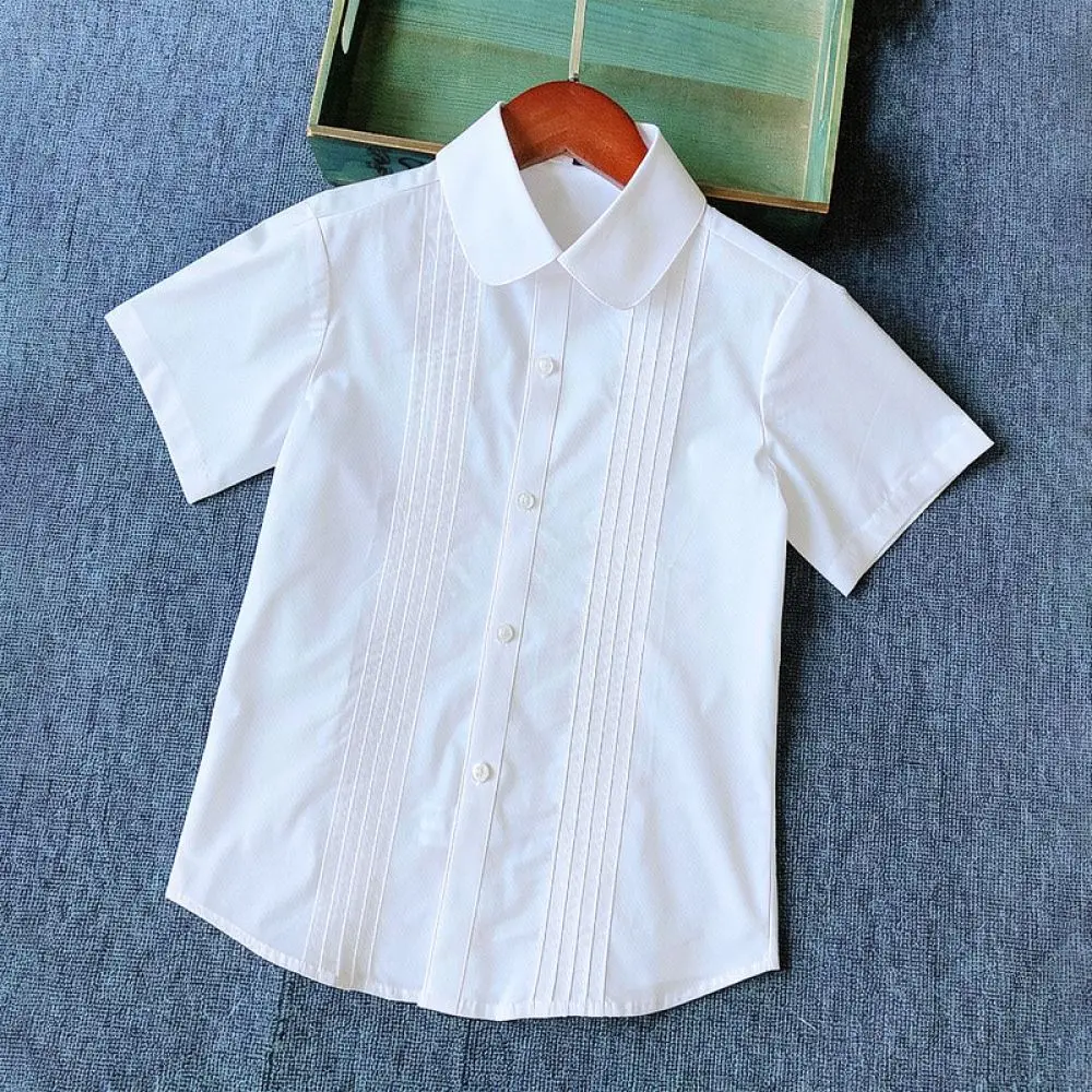 camisa-blanca-de-manga-corta-para-ninas-con-cuello-tipo-«peter-pan»-y-pliegues-ideal-para-el-uniforme-escolar-para-uso-diario-y-como-prenda-de-moda-informal