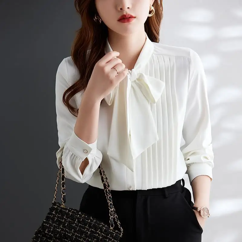 Women's 2024 Summer New Spliced Bow Neck Button Screw Thread Fashion Solid Slim Irregular Casual Long Sleeved Blouses Shirts