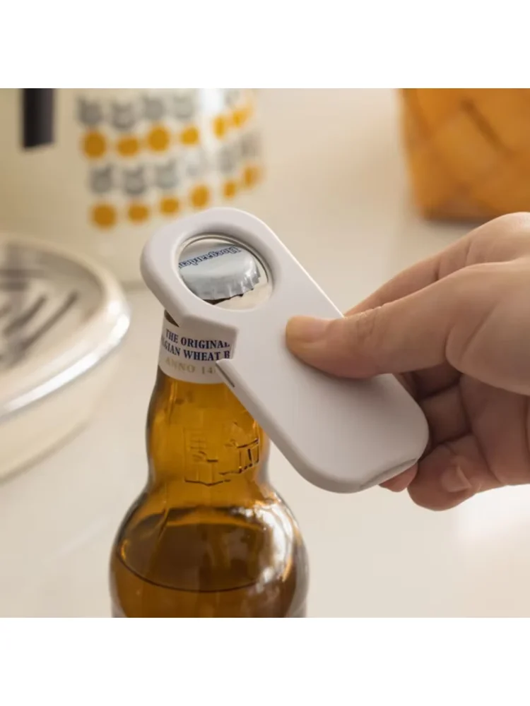 Magnetic Soda Bottle Opener- Sticks to Metal Surfaces, Opens Everything | Compact & Lightweight Design White Kitchen Helper Too