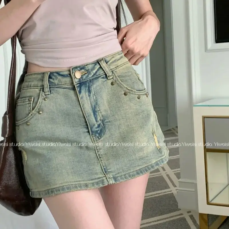 

2024 summer retro nostalgic rivet elastic irregular hole denim skirt with lining Denim Jeans Mini Culottes