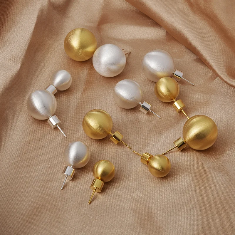 Fashion niche brushed hollow ball stud earrings light luxury high temperament Internet celebrity earrings earrings