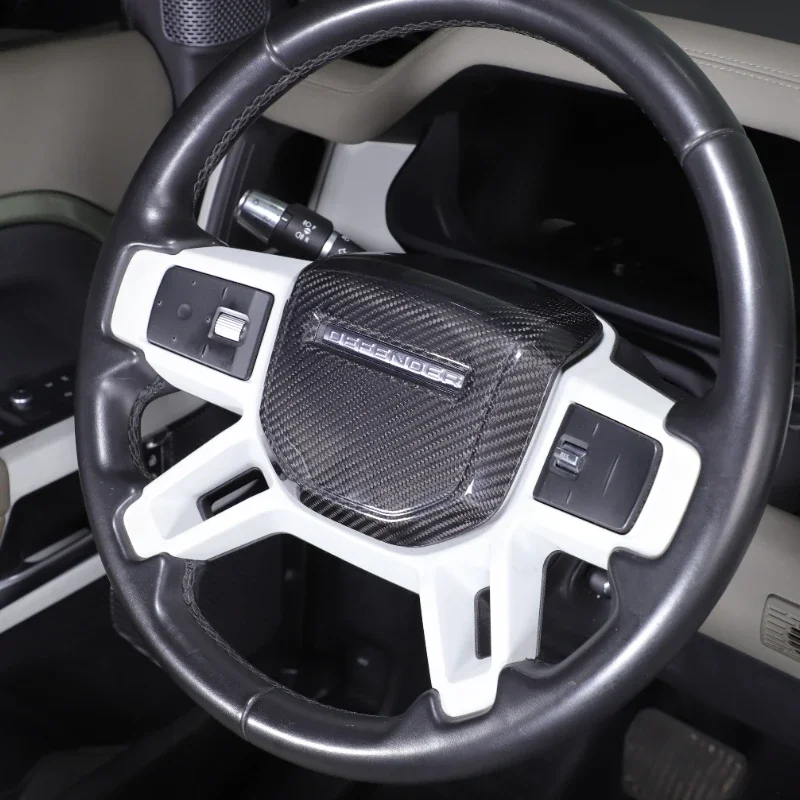 

Real Carbon Fiber Car Steering Wheel Logo Cover Trim Interior Car Accessories For Land Rover Defender 90 110 130 2020-2025