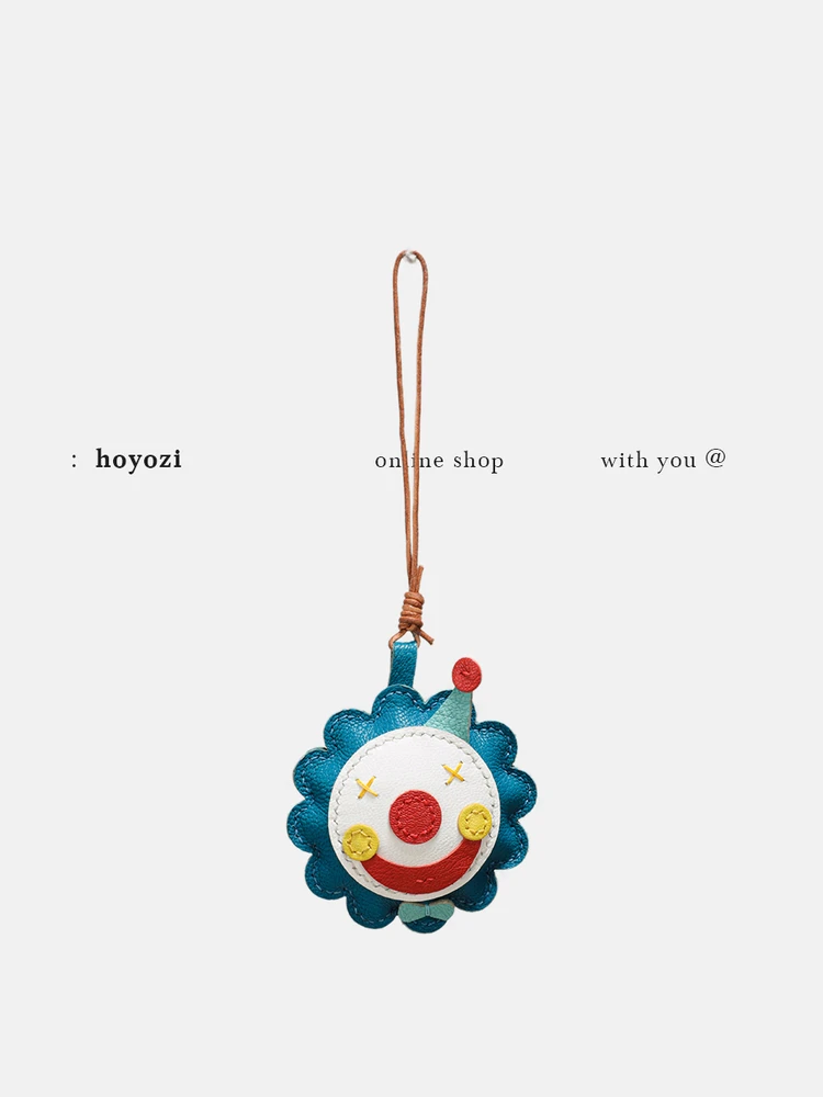 

First layer cowhide bag pendant, leather splicing blue doll ornament