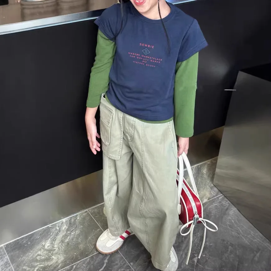 

Girls Top 2026 Spring Korean Edition Fake Two Piece Color Contrasting Letter Base Shirt Western Casual Fashion Daily Versatile