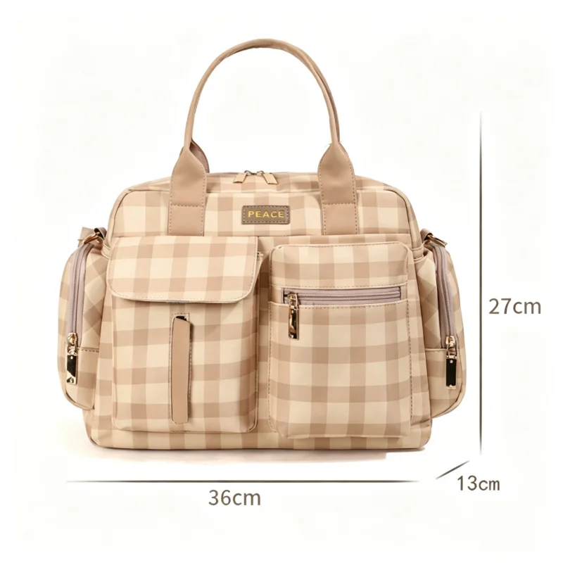 Mama bag - lightweight, adjustable crossbody/handbag with checkered pattern, suitable for carrying diapers and other baby items.