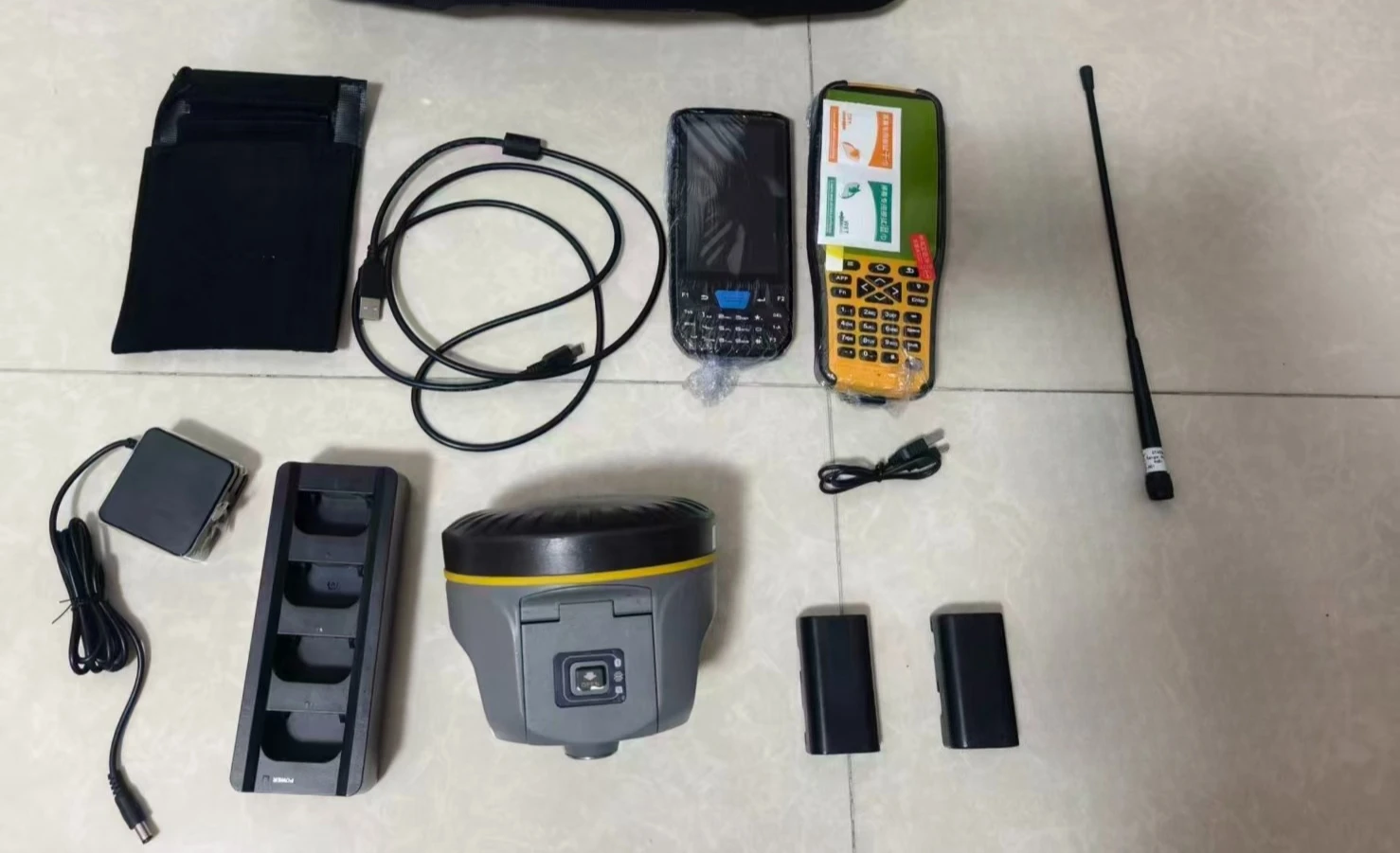 South Galaxy G1 Plus, GNSS RTK receiver, H5 field controller, surveying equipment, dual battery RTK Contact support for details.