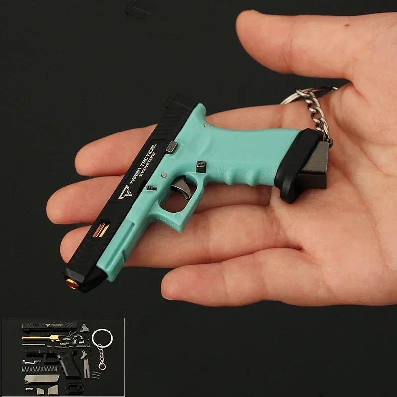 1PC 1:3 Mini Gun Pendant Nylon Hand Grab Half Alloy TTI G34 Pistol Model Metal Keychain