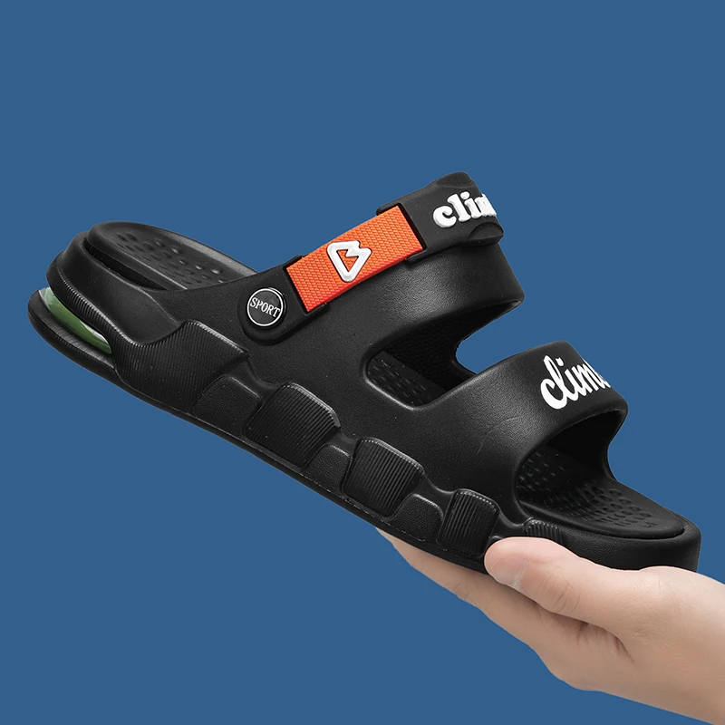 

Новые пляжные сандалии с мягкой подошвой, модные сандалии, мужские тапочки из искусственной кожи, летние удобные и дышащие шлепанцы с запахом на щиколотке 44